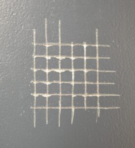 ensayo de adherencia de pintura por corte por enrejado